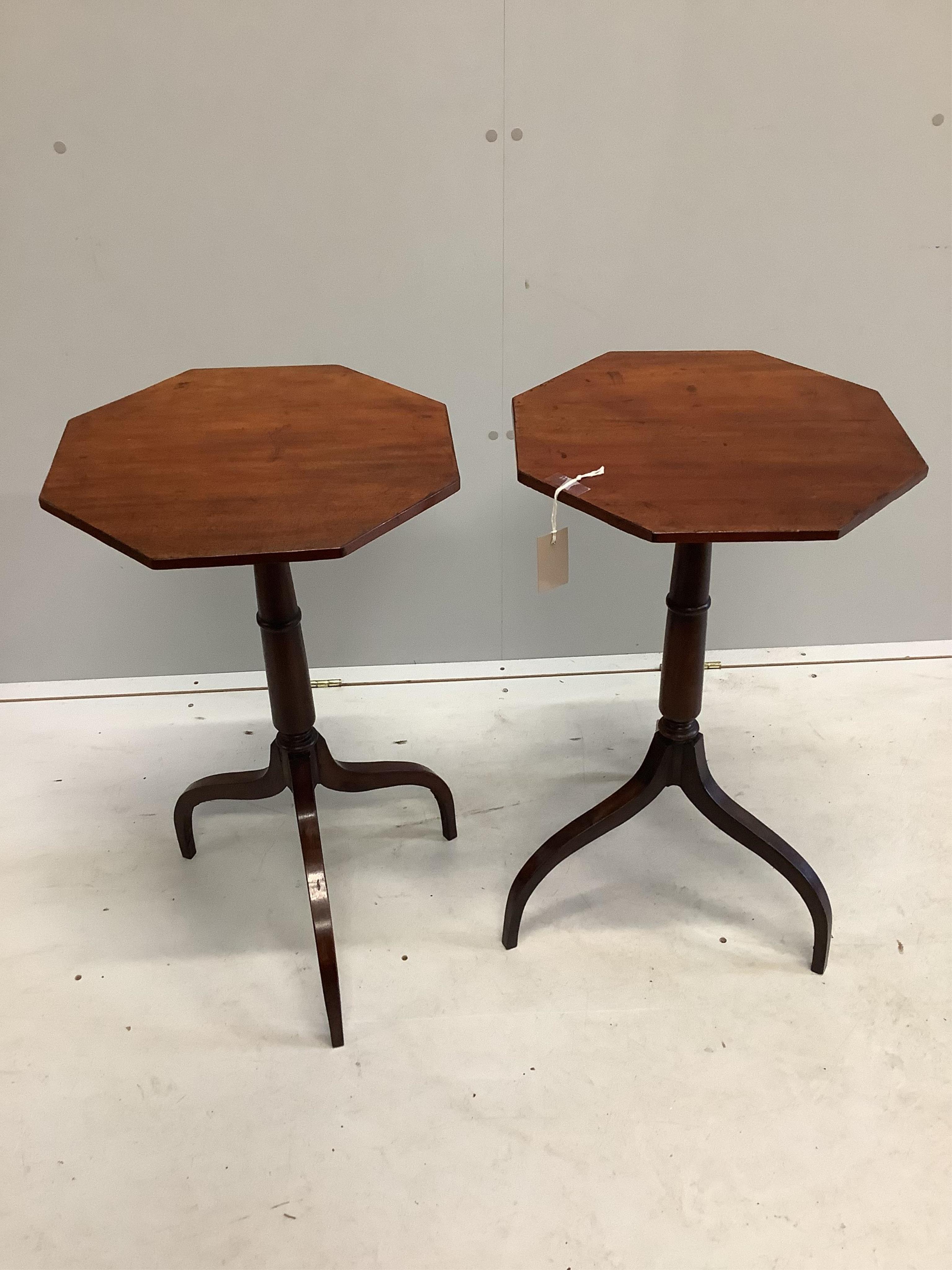 A pair of Regency style octagonal mahogany tripod wine tables, width 41cm, height 72cm. Condition - fair